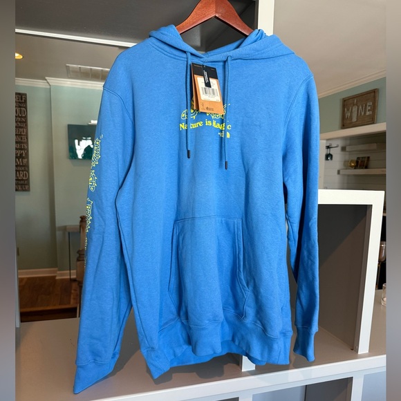 NWT The North Face Blue Hoodie with Yellow Graphic “Nature is Magic” - Picture 1 of 9